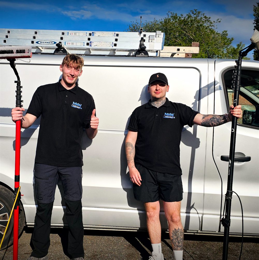 Ben and James of Morgan & Walker with their van and water-fed poles