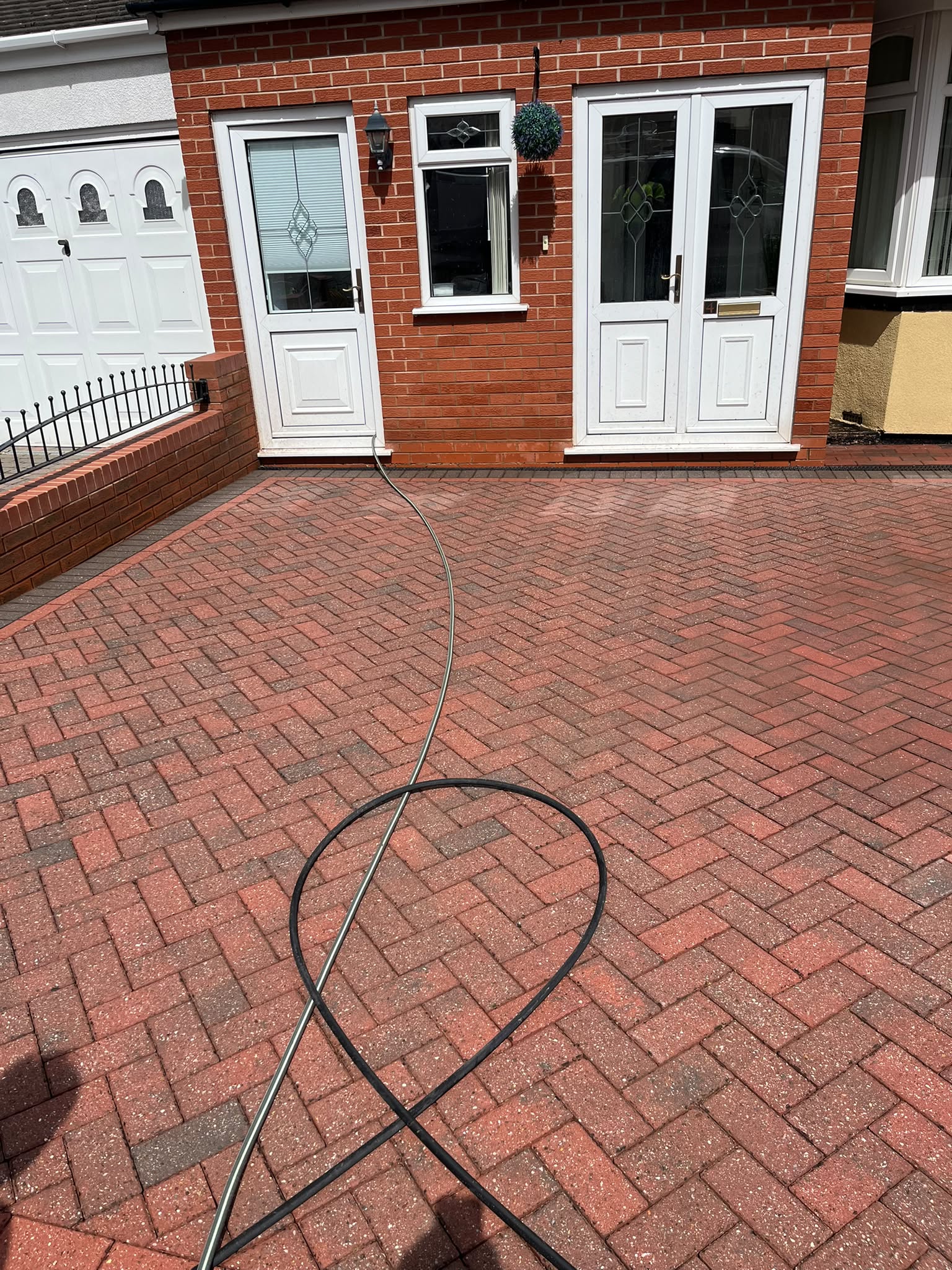 Clean block-paving driveway after pressure washing